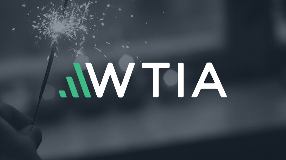 WTIA logo on image of person holding a sparkler. The Power of We in the technology industry